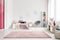 Pink spacious bedroom interior