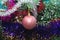 Pink sphere among a colour tinsel