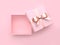 Pink square gift box open metallic bow-ribbon valentine concept 3d render