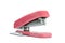 A pink stapler in white background