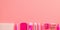 Pink stationery on pink background top view flat lay with copyspace