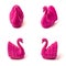 Pink statuettes of swans isolated on a white background