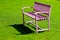 The pink steel bench On green grass