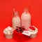 pink strawberry milkshake in bottles cocktail straws, cute cupcakes ,gift box