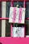 Pink striped open sign