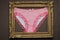 Pink Striped panties, wooden frame