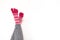 Pink stripped socks with separate fingers on the white background with copy space.