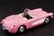 Pink stylish classic sports car