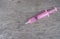 Pink syringe with medicine dose for patient