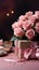 Pink table hosts Mother\\\'s Day: Rose, kraft gift box in chic arrangement.