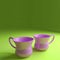 Pink Tea Cups Green Background