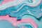 Pink and teal liquid ink swirl abstract background with ravishing wavy pattern.