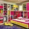 Pink teenage bedroom in a mess