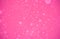Pink texture background with white dotted pattern. Valentines da