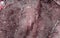 Pink textured granite surface