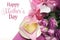 Pink theme breakfast with heart shaped toast, roses and polka dot gift with Happy Mothers Day sample text