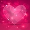 Pink thin shining glass heart on lights background