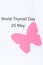 Pink thyroid shape and inscription World Thyroid Day 25 May. Problems with thyroid