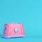 Pink toaster on bright blue background in pastel colors. Minimalism concept