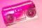 pink toned picture of retro boombox