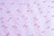 Pink translucent fabric embroidered with beads. Get a red carpet