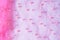 Pink translucent fabric embroidered with beads. Get a red carpet