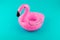 Pink, trendy, blown beach flamingo on a blue background. Hit the summer