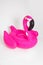 Pink, trendy, blown beach flamingo on a white background. Hit the summer