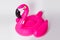 Pink, trendy, blown beach flamingo on a white background. Hit the summer