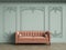 Pink tufted sofa in classic vintage interior with copy space