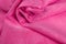 Pink twisted fabric close-up