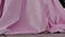 Pink velvet fabric fluttering in the wind. Close. Table cloth, curtain
