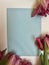 Pink velvet tulips on a blue background. Happy Birthday greeting card