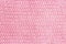 Pink vertical line knitting fabric texture background or knitted