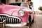 Pink Vintage Antique Car. Buick Super Convertible Sedan Parked Aside the Road in an Old Neighborhood of Patras, Greece