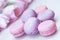 Pink and violet Macaroons close-up, spring flowers, tulips, tender pastel background. Romantic morning, gift for beloved