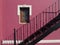 Pink wall with Stairway