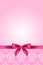 Pink wallpaper with bow