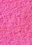 Pink washing sponge with visible details