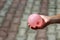 pink water balloon in childrens hand - summer fun