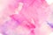 Pink watercolor texture background. The color splashing on the paper.