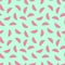 Pink watermelon slices seamless pattern on mint green background.