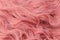 Pink wavy hair pattern. Top view