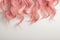 Pink wavy hair pattern. Top view