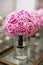 Pink wedding bouquet of roses in a vase for a ceremony