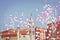 Pink and white balloons on a blue sky at historic center of the Croatian town of Zadar at the Mediterranean Sea, Europe