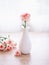 Pink white pastel Dianthus Carnation flowers in vase on table, Clove pink ,still life for background or wallpaper for text letter