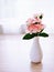 Pink white pastel Dianthus Carnation flowers in vase on table, Clove pink ,still life for background or wallpaper for text letter