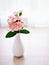 Pink white pastel Dianthus Carnation flowers in vase on table, Clove pink ,still life for background or wallpaper for text letter