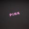 Pink writing on black paper background